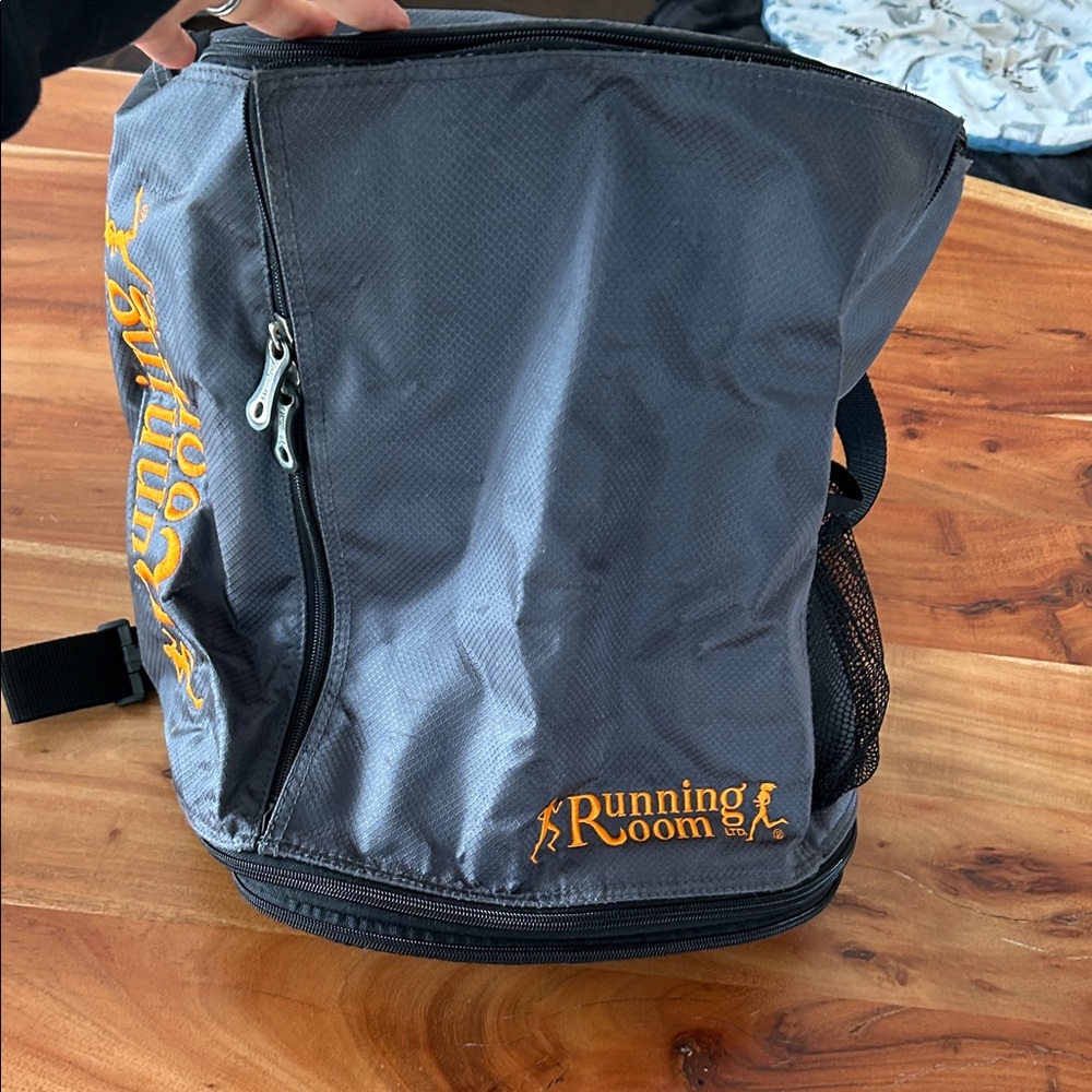 Running Room Travel Race Backpack that can be unzipped to lay flat